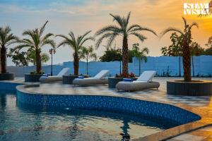 StayVista at Saya Infinity with Pool, Lawn