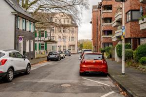 Zentrales City Apartment EDEN - 1 Min zum HBF - Ideal für Trips nach Köln, Düsseldorf, Wuppertal, Messe - Balkon, Küche, 2 Zimmer, Renoviert 2025