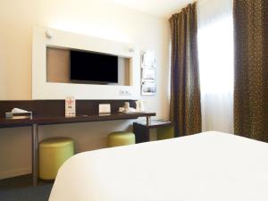 Hotels Kyriad Hotel Orly Aeroport - Athis Mons : photos des chambres