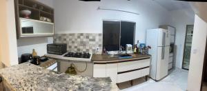 Casa com piscina e área kids