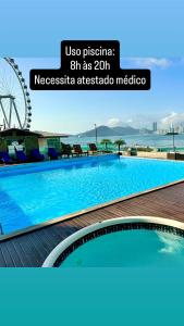 Roda Gigante, garagem e piscina