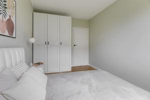 Ptasia 55 Prestige Apartment with Garden by BookingHost