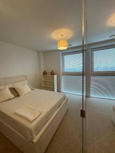 En-suite QueenRoom with Parking and gym inRoyal Dock Excel E16