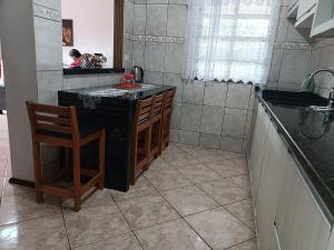 Casa com Piscina - Localização Estratégica