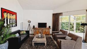 Villa 09, piscine chauffée 8 personnes à 2 pas de locéan