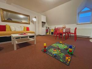 Podkrovní byt nedaleko Klínovce