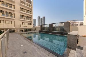 Waves - Modern Comfort in JVC - Elegant 1BR Stay