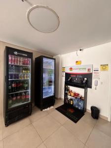 Apartamento Aconchegante e Elegante com Ar-Condicionado, Piscina, Garagem e Varanda Gourmet a 3 min da Praia