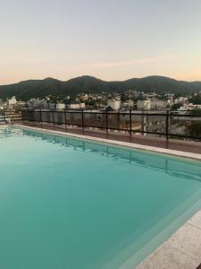 Apartment in downtown Carlos Paz with pool