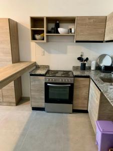 Apartment in downtown Carlos Paz with pool