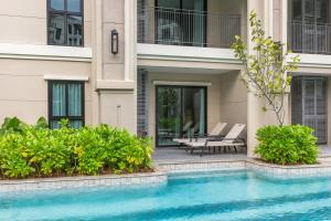 Porto 1BR Pool Access Suite at Title Legendary by TropicLook