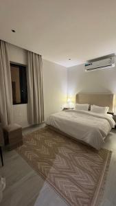 شقق ملاذ الفندقية