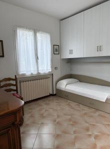 Villetta centrale con giardino e posto auto