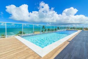 Ocean Blue #02 - Studio com piscina por Carpediem