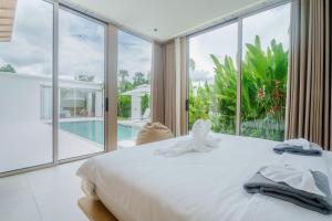 Brand New Asherah Pool Villa next to Bangtao Beach VVPHU52