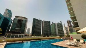 Stunning Canal View 1BR Apartment Burj Khalifa And Dubai Mall 10 Min Walk Ideal for Up to 4 Guests