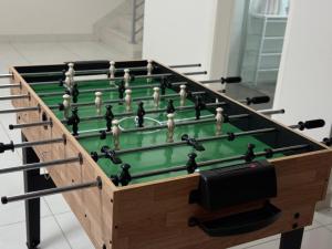 Urban Silver Haven Sleek stay - 1 Min to Station With TV projector Game space and high speed internet