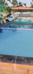 Siva Rama garden resort 10 members BIG ac room&1 Noon ac room at swimming pool view, ,box cricket ,born fair,BBQ,kichan withequipment etc nr beach road bheemilli vishakapatnam