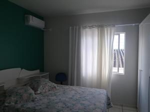 Casa Av Palestina, 2 quartos com ar condicionado e garagem