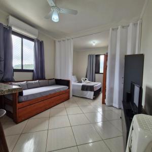 Apto Studio 3º andar vista do mar praia Massaguaçu,Ar condicionado e wi-fi, a 7 min de carro da praia da Cocanha