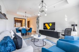 Vogue Vacation Homes, Downtown Opera Grand near Burj Khalifa and Dubai Mall, Two Bedroom Apartment with Large Balcony and Burj Khalifa view, Access toAmenities