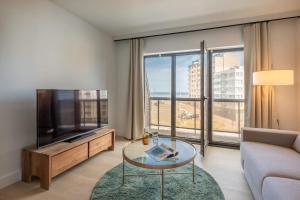 Bright Seaside Apartment with Balcony