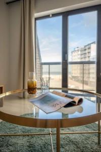 Bright Seaside Apartment with Balcony