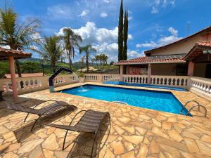 Refúgio com Piscina Climatizada e Forno de Pizza