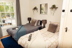 Central City Oasis - Sleeps 4 Parking Included 3 Mins walk to Queens Station