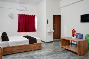 Hotel O Jodi Sri Muneshwara Swamy Temple