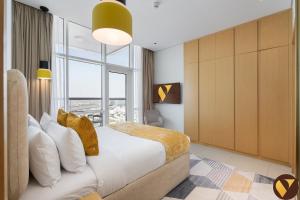 Vogue Vacation Homes, Novotel Residences JVT near Springs Souk Mall, One Bedroom apartment with Balcony and Vibrant Community View, Access toAmenities