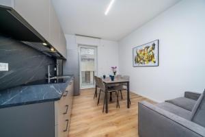 GuestHost - La Corte Del Pozzo Apartments