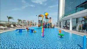 Vogue Vacation Homes, JVT Novotel near Springs Souk Mall, Studio Apartment with Balcony and City View, Access toAmenities