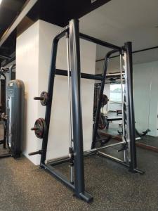 Minimalist 1BR Condo with NETFLIX at AEON TOWERS near Abreeza Mall by Rico