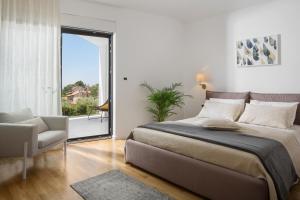 Villa Mariva for 8 persons near Porec with 44 m2 heated pool, sea view, fitness & kids playground