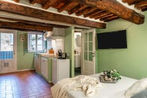 Avvolgente monolocale in centro a Lucca