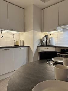 New one bedroom with terrace close to airport