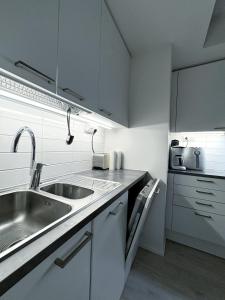 New one bedroom with terrace close to airport