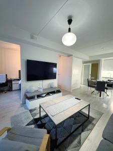 New one bedroom with terrace close to airport