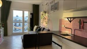 Cozy Studio with Balcony near Chopin Airport