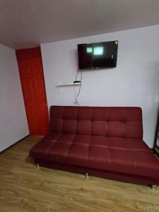 Suite Roja moderna para hasta 3 huéspedes Céntrica, cómoda y con excelente conectividad