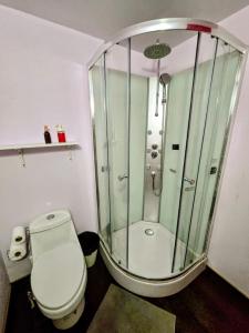 Suite Rosa familiar para hasta 6 huéspedes Amplia, céntrica, con cocineta y baño privado