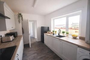 Mid Street Retreat, Steps from the Beach, Whitehaven