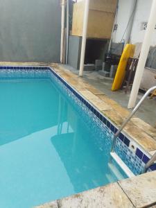 Casa com piscina! Sol da justiça!