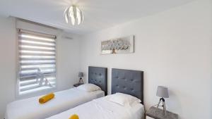 Lumineux 3 pièces avec terrasse et parking - proche plage