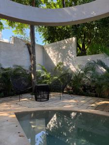 Aldea 58, cabañas de lujo con piscina en Merida centro