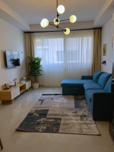 Modern Cozy Apartment in Sunny Village ,Prime Location, aqua park ,Pool Access