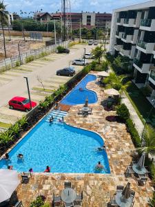 Mana Beach Flat completo - 2 quartos 2 banheiros 2 vagas garagem com vista para o mar e piscinas