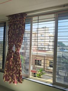 1 big furnished studio apartment with a pantry including fridge, utensils, gas stove and a washing machine with attached bathroom that can accommodate minimum 4 people