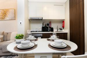 1BR Facing Canal and City Views, Just a Short Walk to Bus Stop and Marine Transport, Reva Residences, Business Bay by Deluxe Holiday Homes